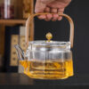 Hammered Pattern Steam Boiling Lifting Beam Glass Teapot