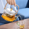 Hammered Pattern Steam Boiling Lifting Beam Glass Teapot